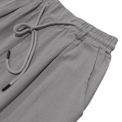 2024 drawstring men's simple fashion solid color casual cotton and linen straight trousers.