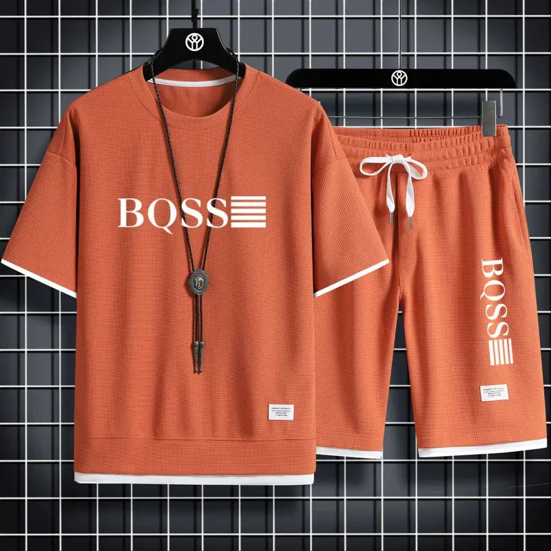 Summer fitness jogging loose sportwear set men's solid color short-sleeved casual T-shirt + shorts breathable two-piece set.