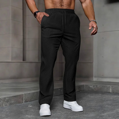 Men's sporty casual trousers, fashionable jacquard elastic waist street pants, solid-color loose all-season pants.