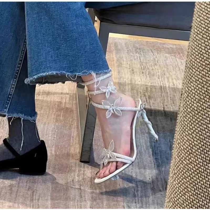 Luxury Crystal Embellished Butterfly Detail Women Sandals Sexy Coiled Strap Thin High heels Gladiator sandals Summer Party Shoes.