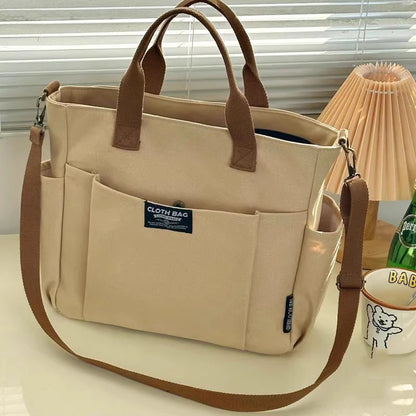 Urban Minimalist Female Student Large Capacity Commuting Horizontal Canvas Single Shoulder Diagonal Cross Portable Tote Bag.
