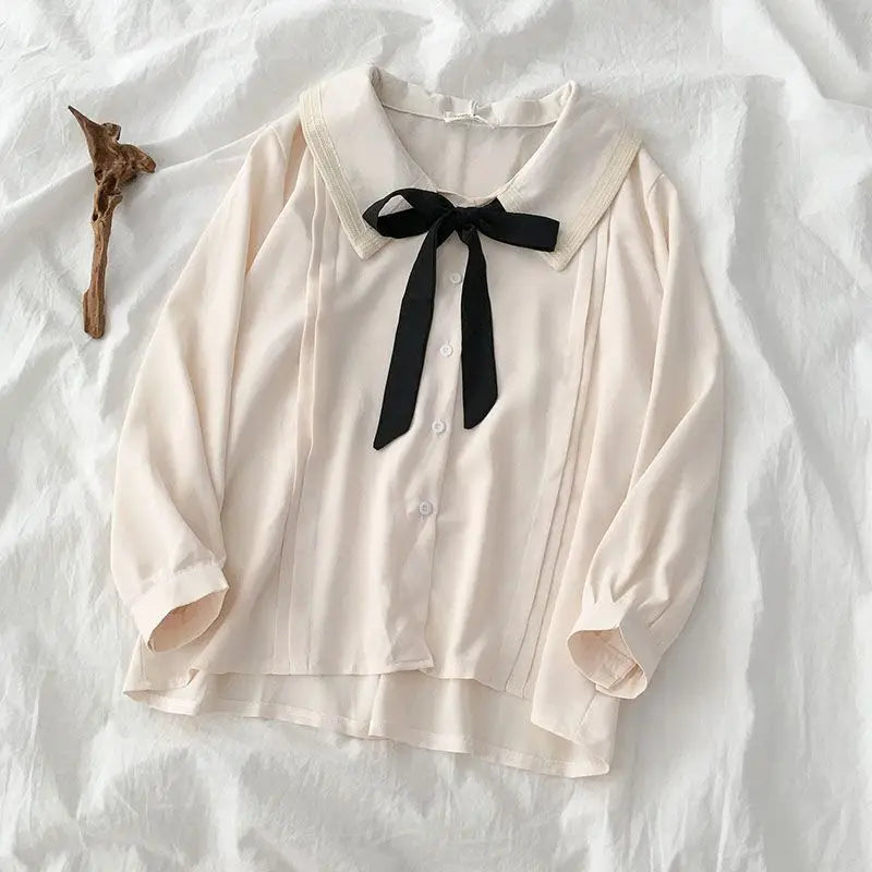 Large Size Niche Design Sense Single-breasted Women Shirt Autumn New Korean Lace-up Bow Blouse Female Solid Color Women Shirt.