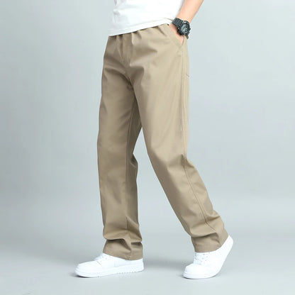 Big Size Men's Casual Cotton Trousers Loose Fit Straight Pants Multi Pocket Big Man Long Pants Mens Jogger Pants Summer Autumn.