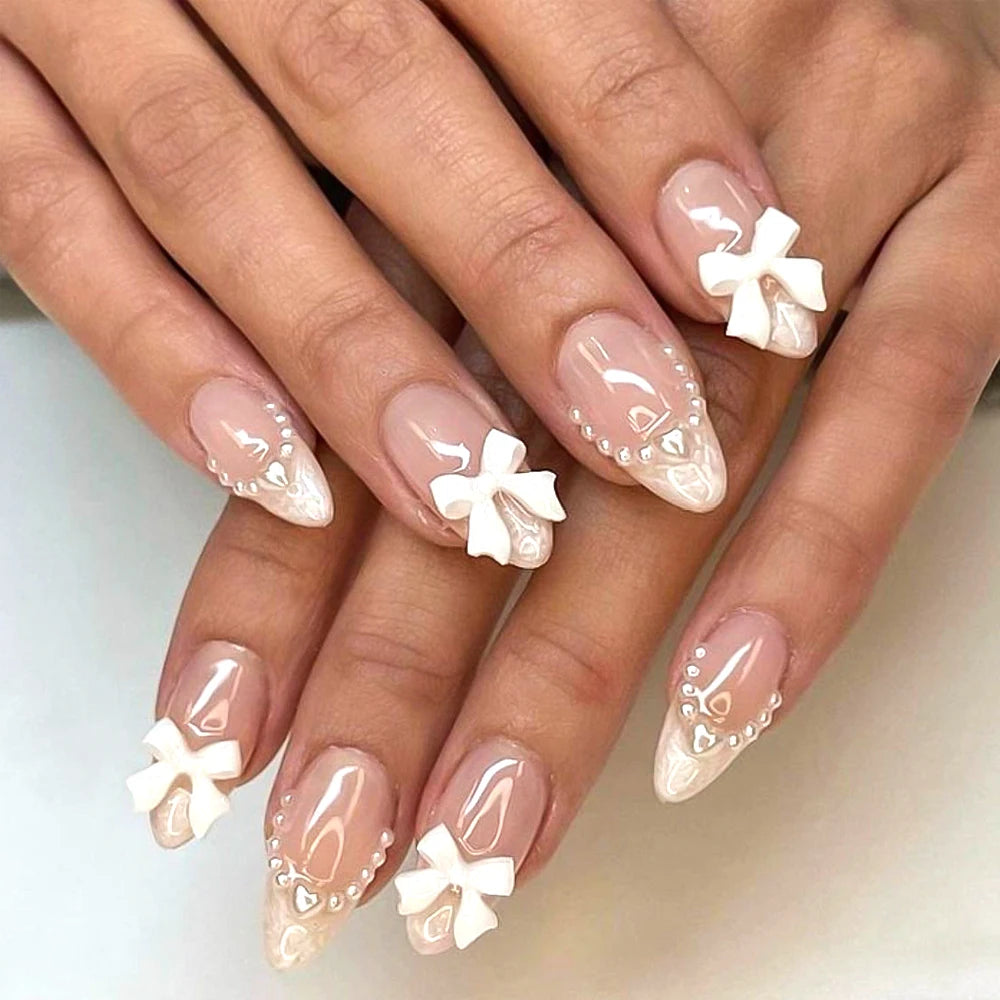 24pcs(+Tools) Pearl Bow Nude Pink Press On Nails White French Fingertips Almond Full Cover Fasle Nails New Year Nail Accessories.