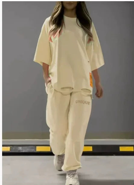 Summer New Fashion Hollowed Out O Neck T Shirt Women's 2 Piece Set Solid Color Casual Relaxed Tracksuit Pants Pocket Female Suit.