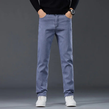 Male Brand Jeans Clothing Light Luxury Stretch Looes Fit Pants Comfortable Soft Business Fashion Straight Casual Denim Trousers.