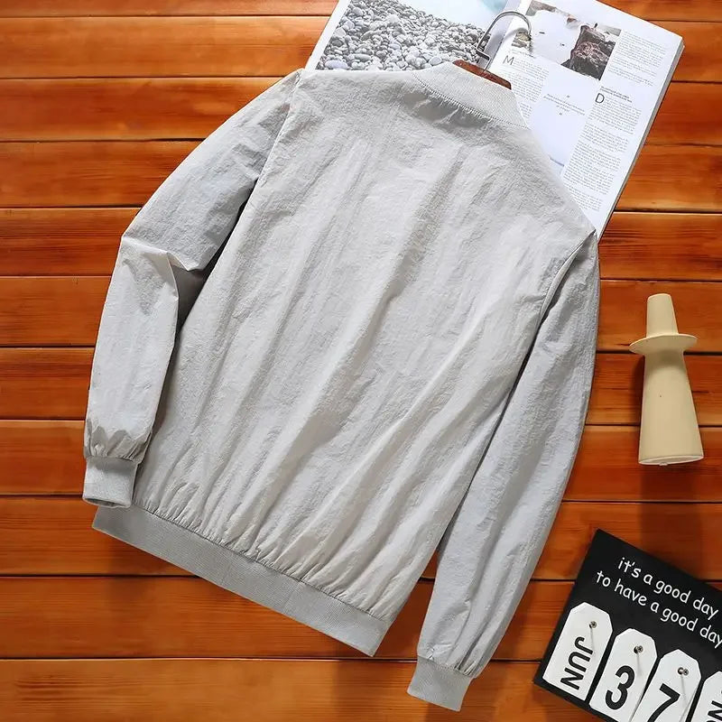 2024 Summer New Thin Style Round Neck Long Sleeve Screw Thread Zipper Jacket Man Solid Color Pockets Casual Sunscreen Clothing.