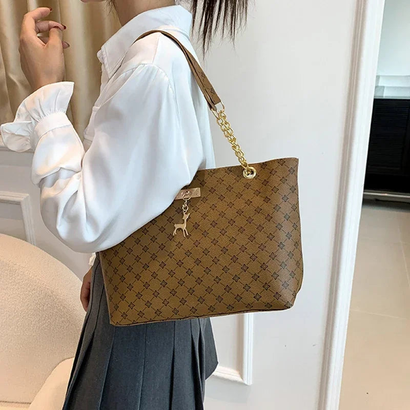 Summer High Quality PU Leather Fashion Large-capacity Shoulder Armpit Women's Bag Work Student Travel Female Retro Handbag Tote.