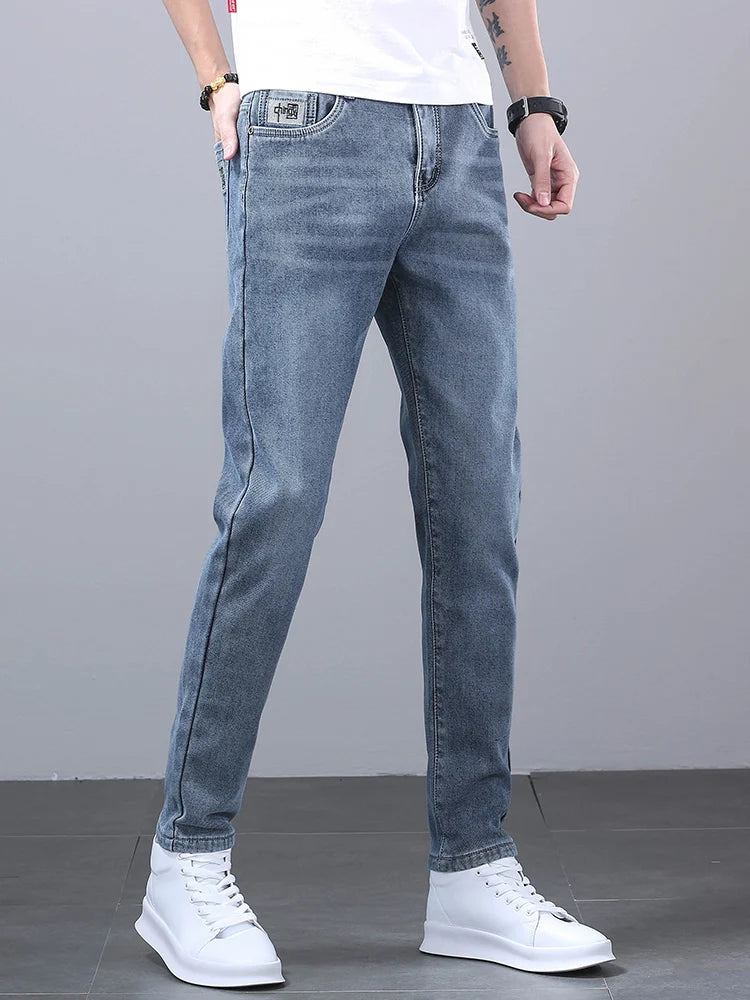 New Men's Four Seasons Business Jeans Fashionable Slim Fit Micro Elastic Straight Leg Long Pants.