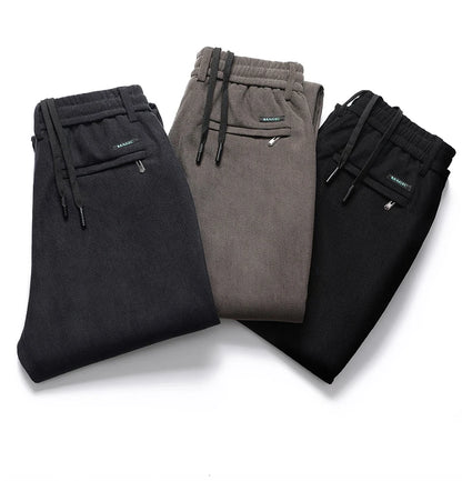 Elastic Waist Casual Pants Men Joggers Loose Fit Straight Pants Spring Autumn Male Trousers Large Size Black Grey.