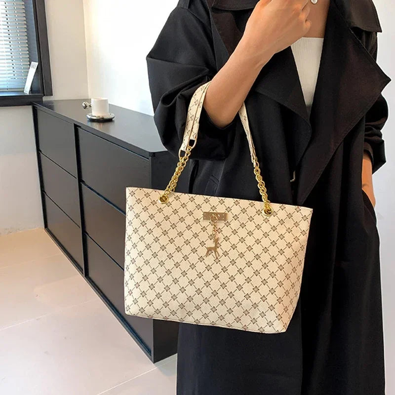 Summer High Quality PU Leather Fashion Large-capacity Shoulder Armpit Women's Bag Work Student Travel Female Retro Handbag Tote.