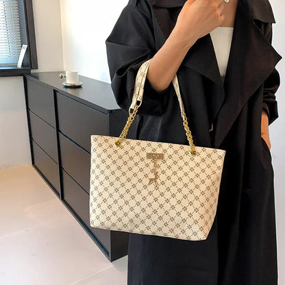 Summer High Quality PU Leather Fashion Large-capacity Shoulder Armpit Women's Bag Work Student Travel Female Retro Handbag Tote.