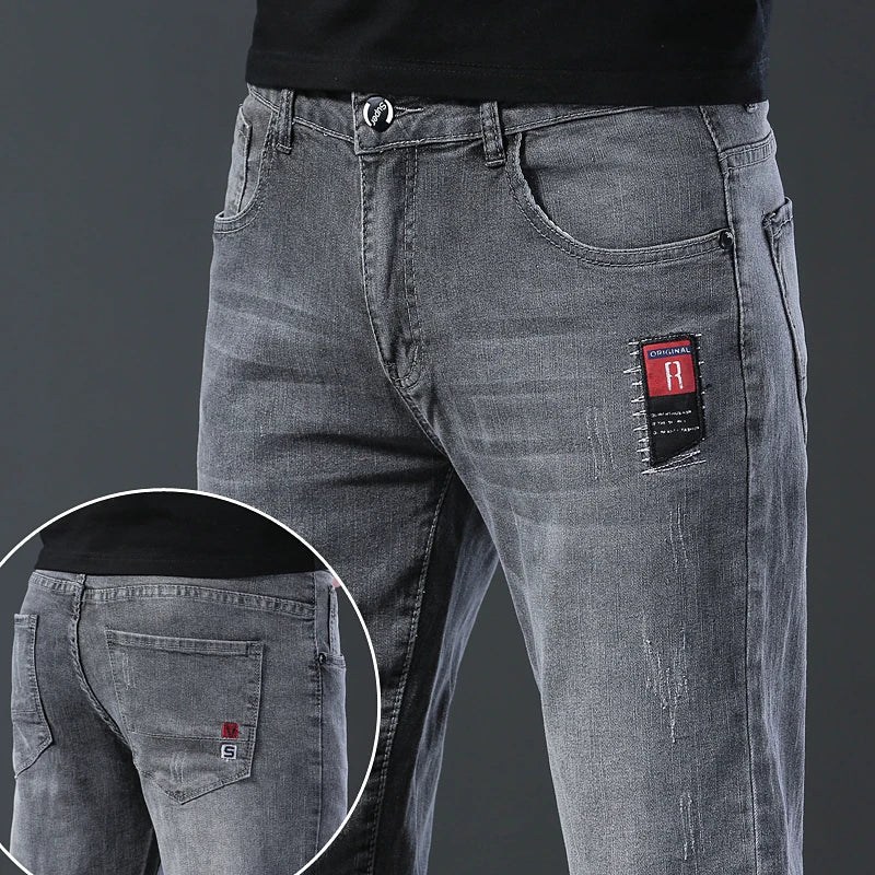 Men's slim fit Korean style comfortable straight leg elastic gray mid waist pants men's casual business jeans.