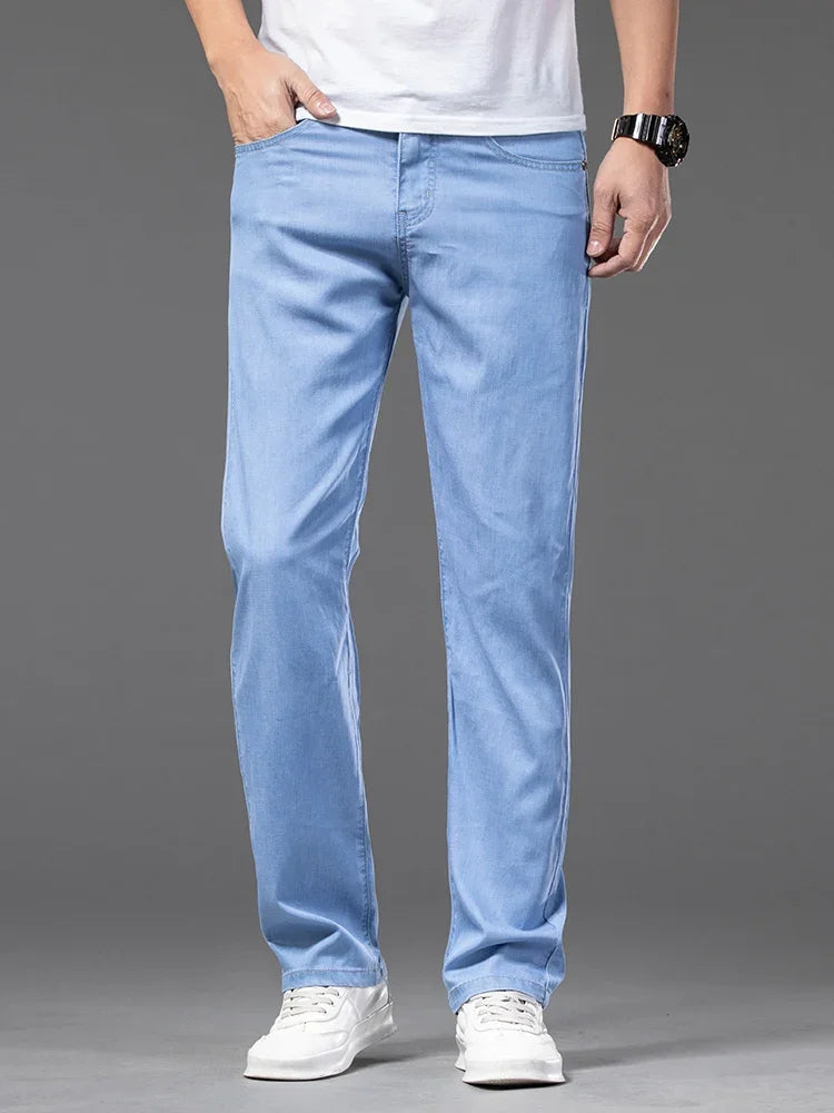 Summer Ultra Thin Men's Loose Jeans Lyocell Ice Silk Fashion Casual Business Denim Pants Straight Stretch Male Trousers.
