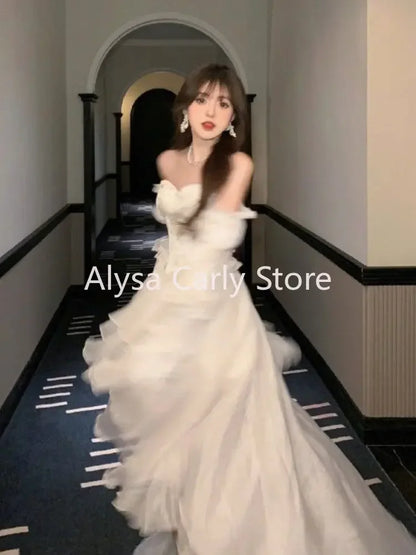 Elegante Rüschen Chic Fee Kleid Frauen Weiß Süße Koreanische Stil Prinzessin Kleid Weibliche 2023 Sommer Slash Neck Casual Party Kleid.