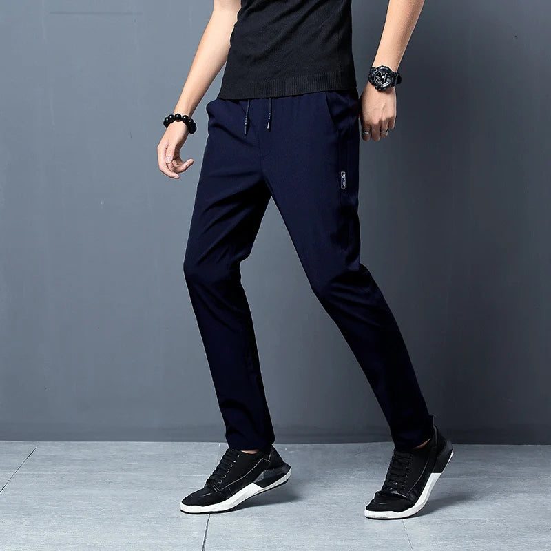 Men's Casual Pants Stretch Slim Fit Elastic Waist Jogger Korean Classic Blue Black Gray Male Brand Trousers Plus Size 4XL 5XL.