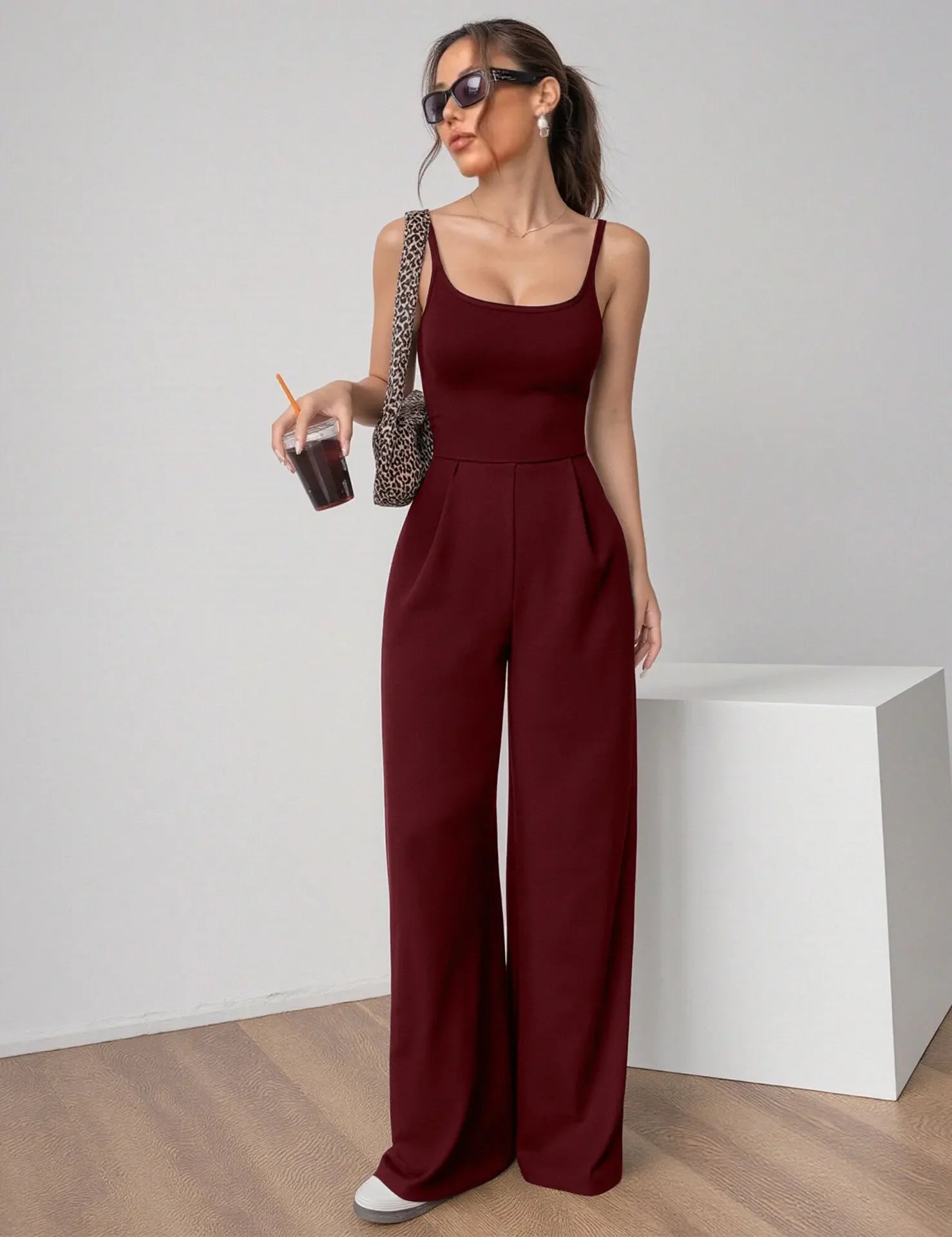 Fashionable Solid Color High Waist Bell Bottom Jumpsuit Backless Strap Casual Women's Long Pants One Piece Suit Female.
