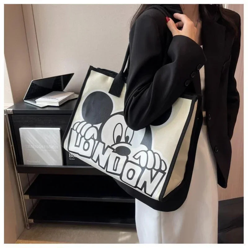 New Disney  Mickey Canvas Bag Women's Versatile Casual Shoulder Bag Commuter Handbag Large Capacity Multifunctional Mommy Bag.