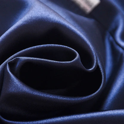 Koreanische Version des Kinder-Pyjama-Sets aus Seidensatin mit langen Ärmeln und Hose, zweiteiliges einfarbiges Cartoon-Set für männliche Babys.