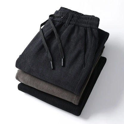 Elastic Waist Casual Pants Men Joggers Loose Fit Straight Pants Spring Autumn Male Trousers Large Size Black Grey.