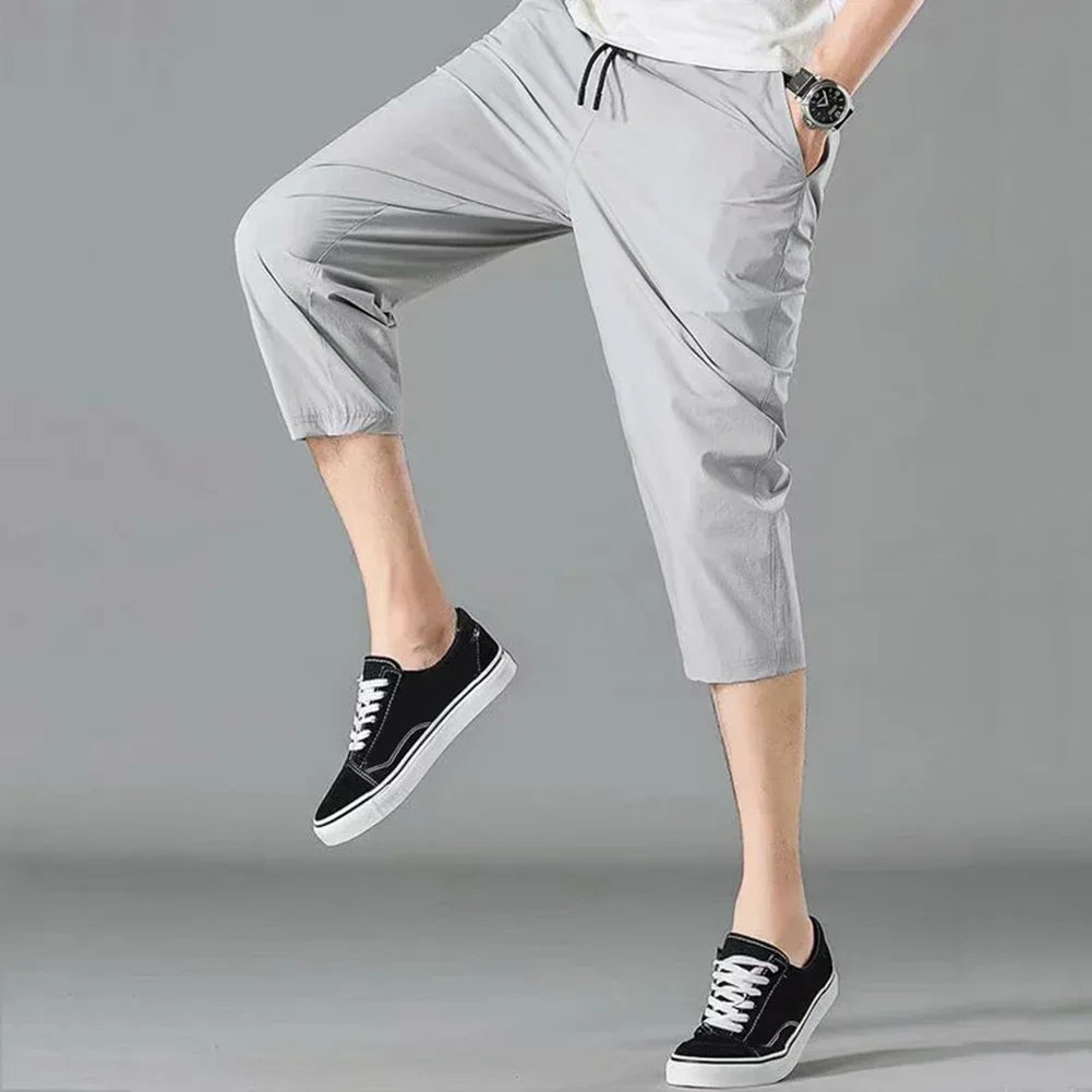 2025 New Summer Men's Ice Silk Pants Hong Kong Style Trendy Loose-Fit Straight-Leg Cropped Pants Korean Version Casual Pants.