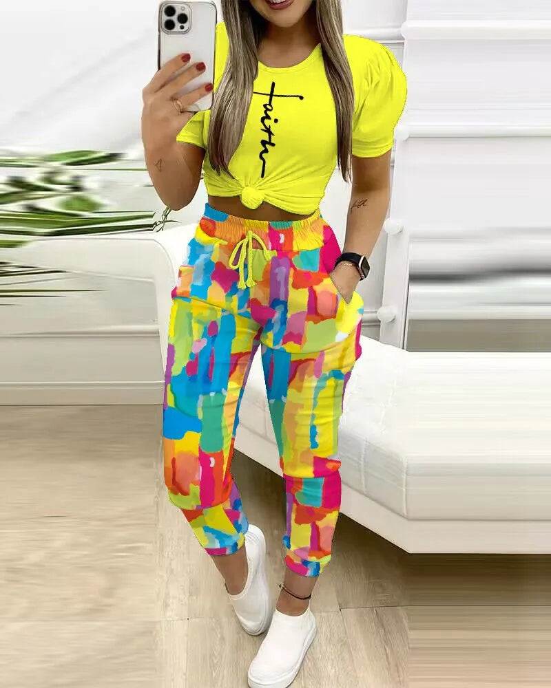 Summer Women's New Short Sleeved Pants Two-piece Commuting Fashion Printed Drawstring Sexy Exposed Waist Pants Set.