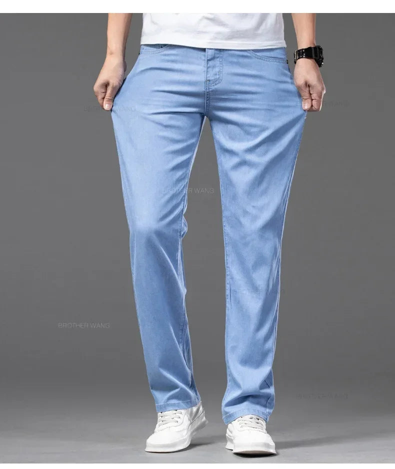 Summer Ultra Thin Men's Loose Jeans Lyocell Ice Silk Fashion Casual Business Denim Pants Straight Stretch Male Trousers.