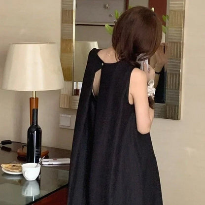 Elegantes ärmelloses langes Westenkleid für Damen, lockerer Rücken, hohles Design, Rundhalsausschnitt, Frühlingsausflugskleid, Prinzessinnenärmel, Polokragen.