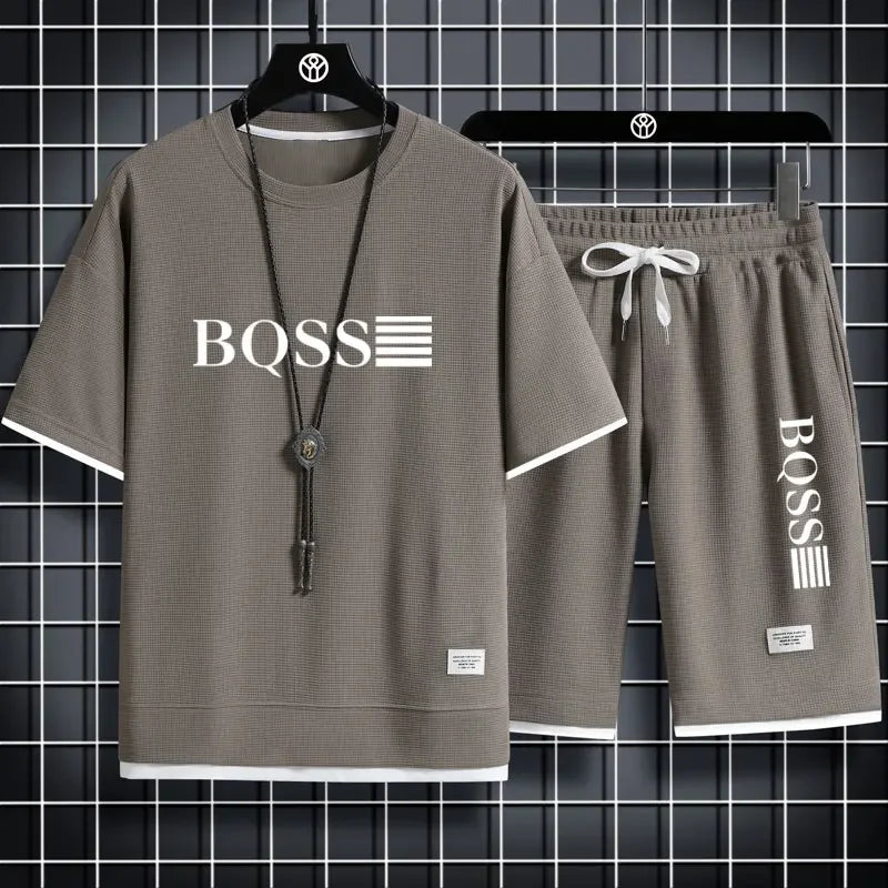 Summer fitness jogging loose sportwear set men's solid color short-sleeved casual T-shirt + shorts breathable two-piece set.