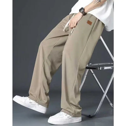Casual long pants for boys, ice silk quick drying pants for spring and summer, thin, trendy brand straight tube, loose, hanging.