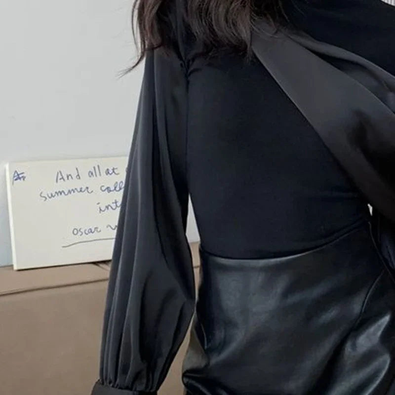 Long-sleeved shirt women's 2024 spring and autumn new light luxury fashion splicing design sense niche temperament versatile top.