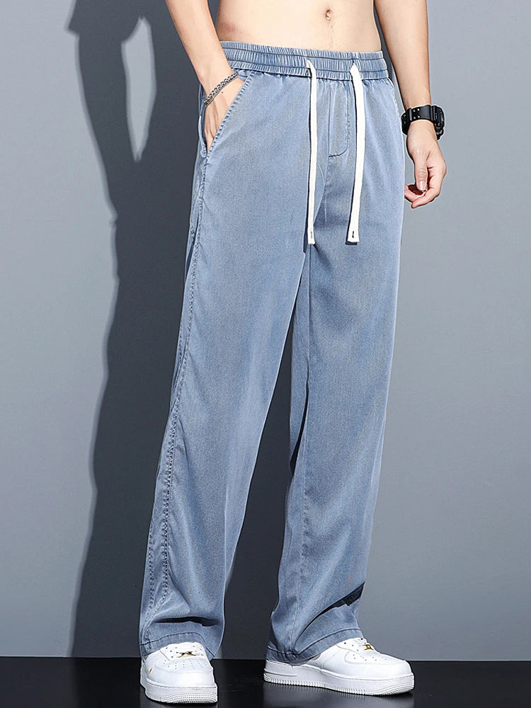 2024 Spring/Summer New Soft Lyocell Fabric Men's Jeans Thin Loose Straight Leg PantsDrawstring Elastic Waist Korean casual pants.