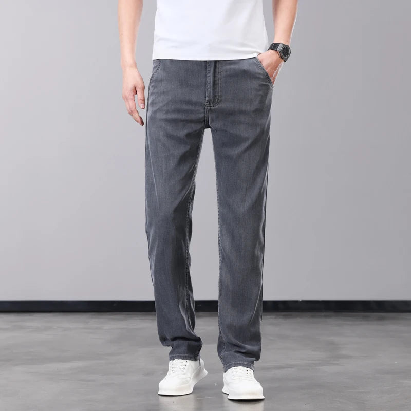 Summer Thin Men's Jeans Lyocell Fabric Soft Breathable Straight Denim Pants Brand Man Elastic Ice Silk Casual Trousers Grey Blue.