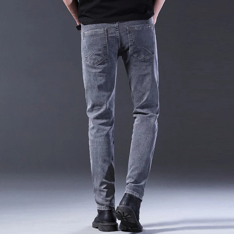 Men New Fashion Comfortable Slim Fit Jeans Male Loose Straight Smart Casual Denim Pants Formal Elasticity Look Taller Trousers.