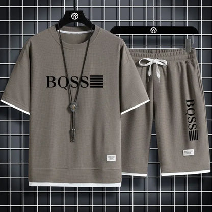 Summer fitness jogging loose sportwear set men's solid color short-sleeved casual T-shirt + shorts breathable two-piece set.