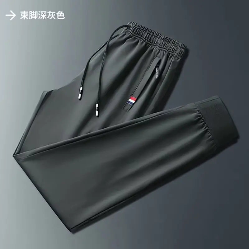 Men's Quick Dry Loose Fit Breathable Summer Lightweight Casual Pants Korean Style Elastic Sweatpants For Men.