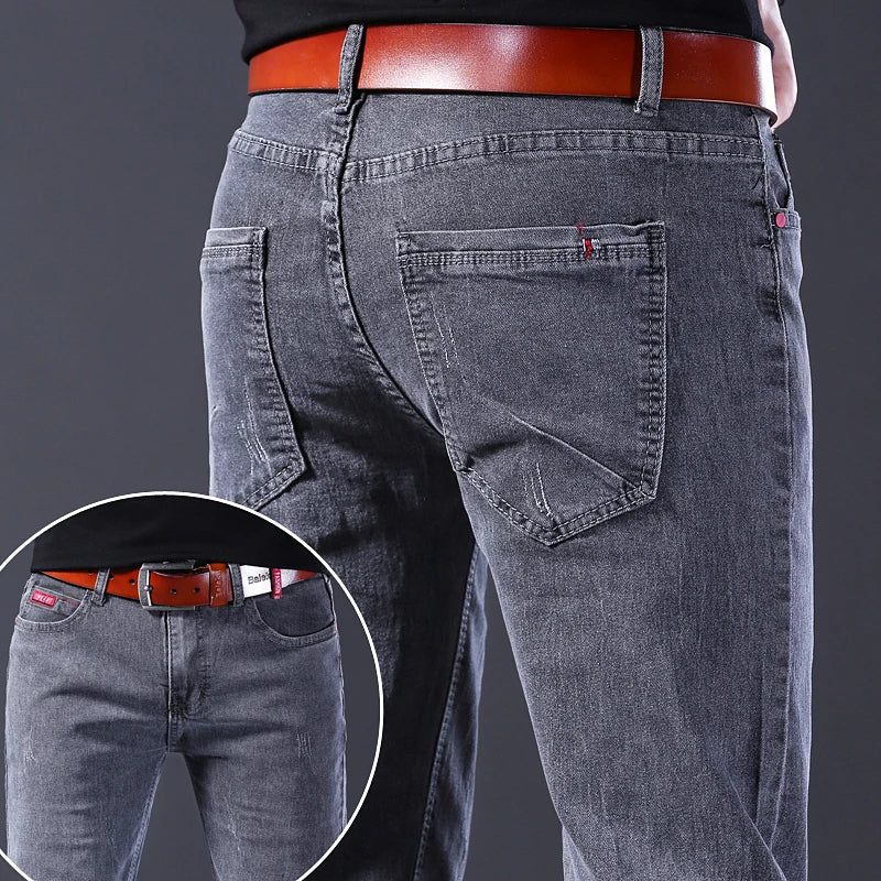 Men's slim fit Korean style comfortable straight leg elastic gray mid waist pants men's casual business jeans.