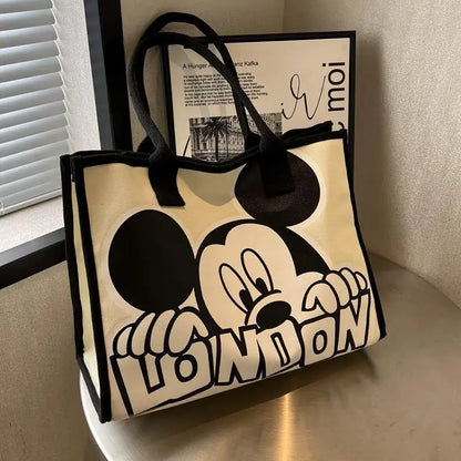 New Disney  Mickey Canvas Bag Women's Versatile Casual Shoulder Bag Commuter Handbag Large Capacity Multifunctional Mommy Bag.