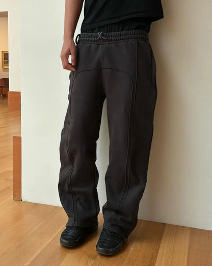 Casual Elastic Drawstring Zipper Pants High Street Hip Hop Streetwear Loose Fit Men's Trousers for Casual Scenarios.