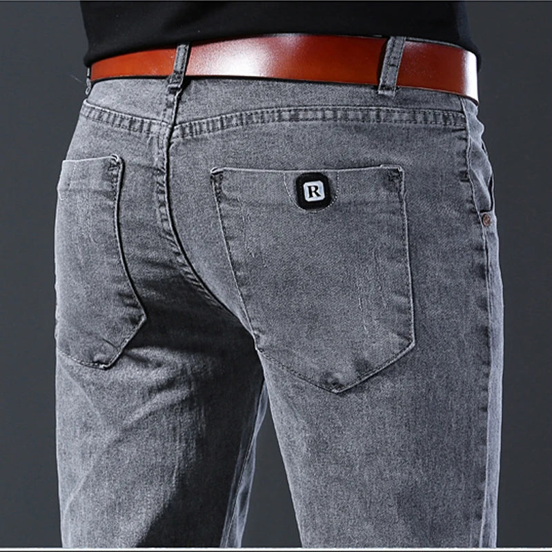 New style jeans, men's slim fit, Korean style comfortable straight leg elastic gray mid waist pants, men's casual denim pants.