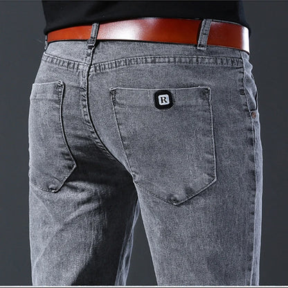 New style jeans, men's slim fit, Korean style comfortable straight leg elastic gray mid waist pants, men's casual denim pants.