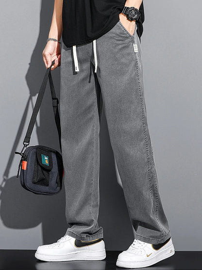 2024 Spring/Summer New Soft Lyocell Fabric Men's Jeans Thin Loose Straight Leg PantsDrawstring Elastic Waist Korean casual pants.