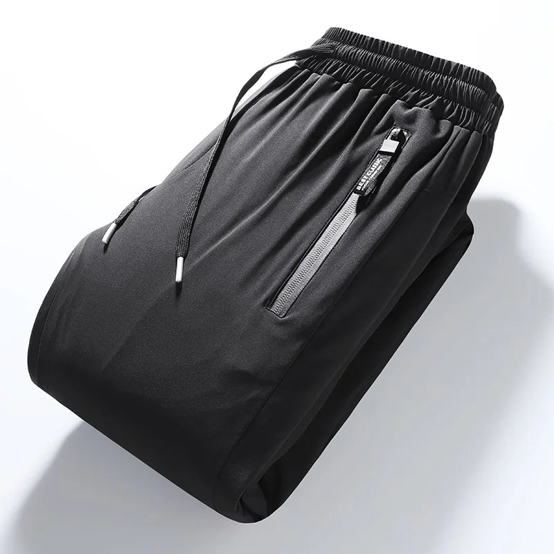 Winter Thick Warm and Windproof White Duck Velvet Legged Pants, New Down Pants for Outward Wearing, Cold Proof Sports Pants.