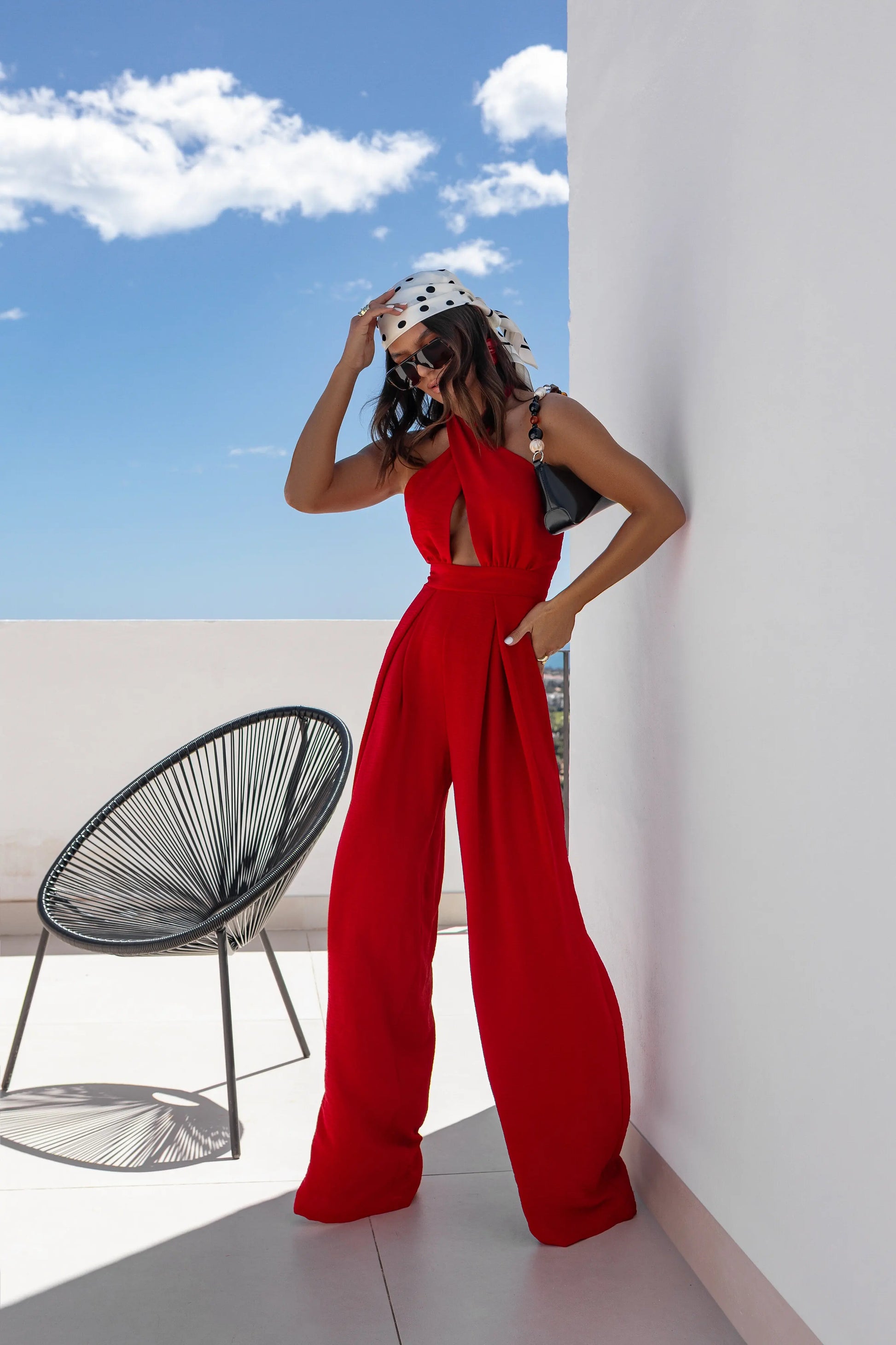 2025 Summer Female Jumpsuits Solid Color Hollow Out But Cross Halter Collar Backless Sexy Lady Wide Legs Jumpsuit Long Pants.