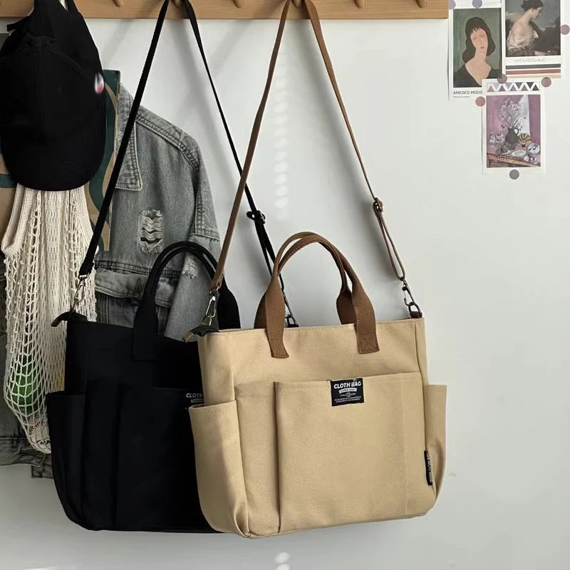 Urban Minimalist Female Student Large Capacity Commuting Horizontal Canvas Single Shoulder Diagonal Cross Portable Tote Bag.