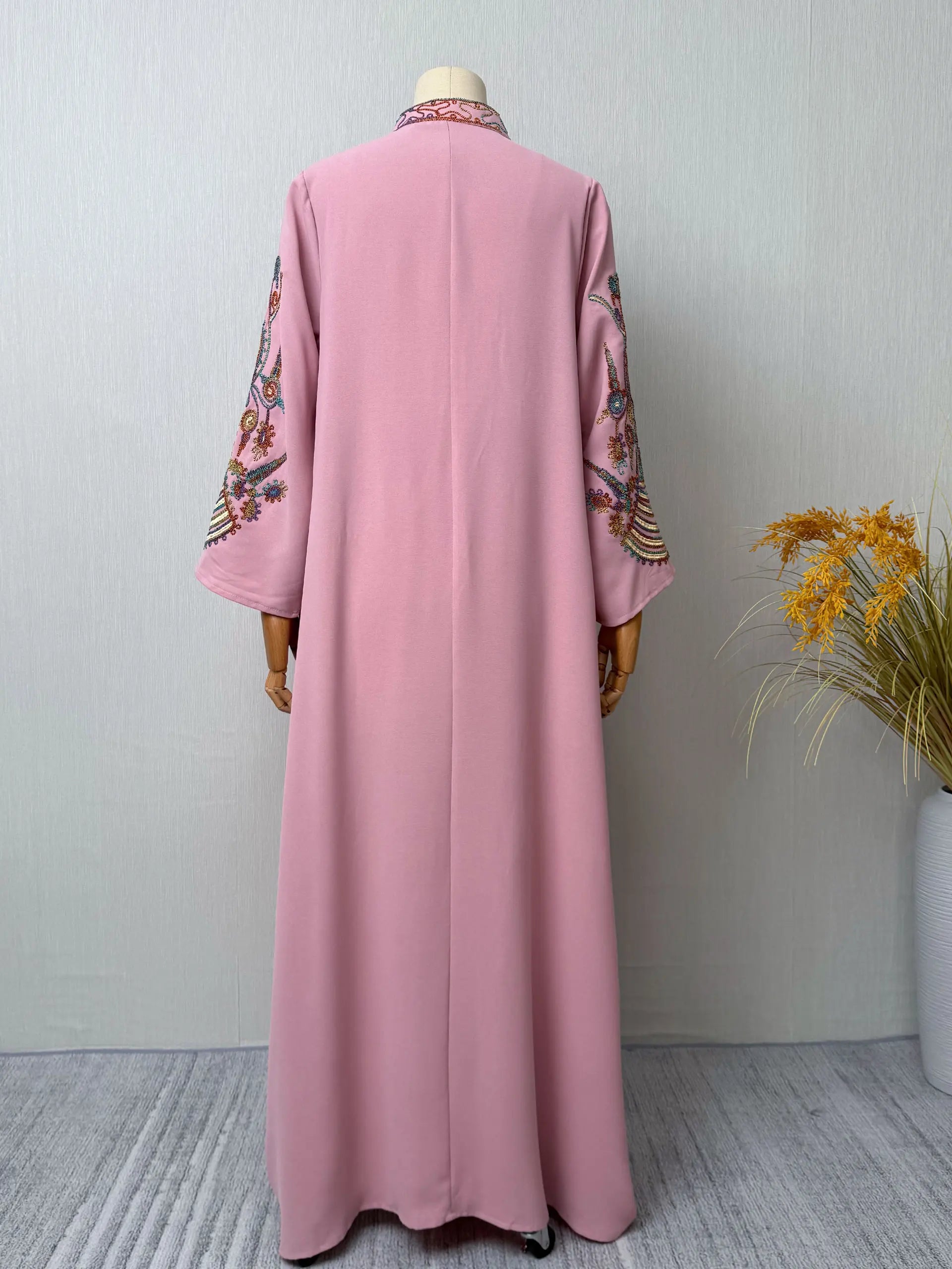 2025 Dubai New Inspired Pink Muslim Abaya Colorful Embroidery on Neckline & Sleeves Perfect for Middle Eastern Cultural Events.