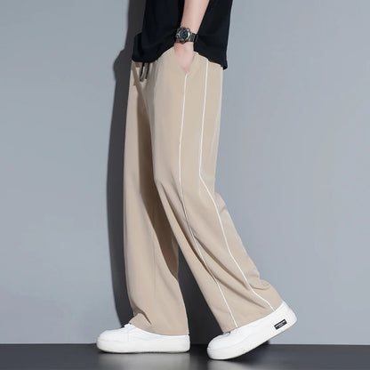 Summer ice silk thin section pants men's Hong Kong style loose splicing casual sports wide-legged pants elastic speed pants