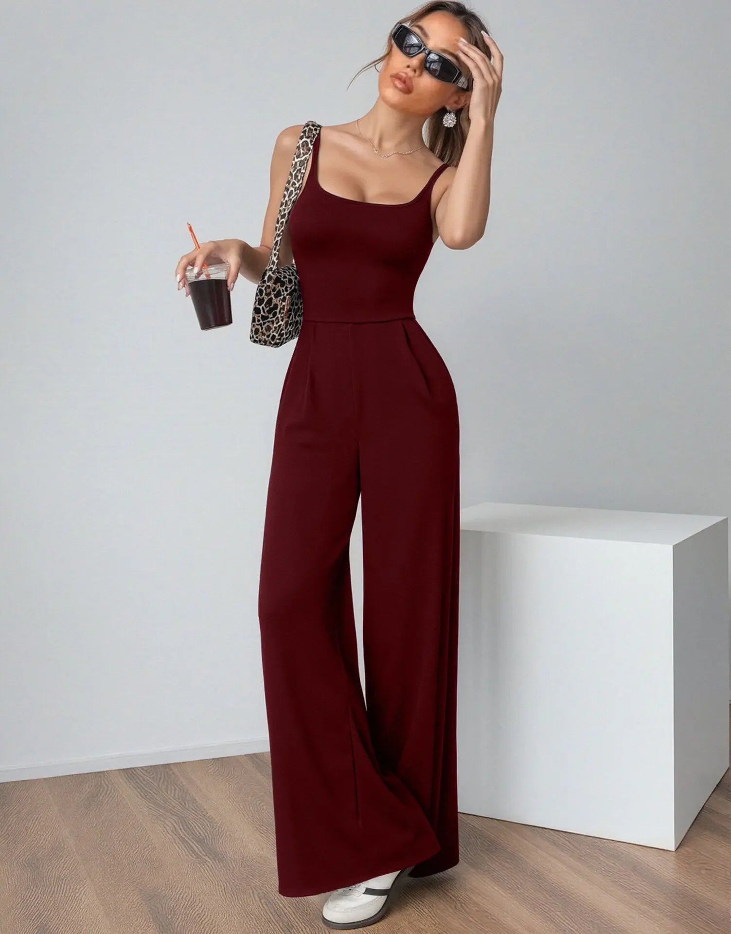 Fashionable Solid Color High Waist Bell Bottom Jumpsuit Backless Strap Casual Women's Long Pants One Piece Suit Female.