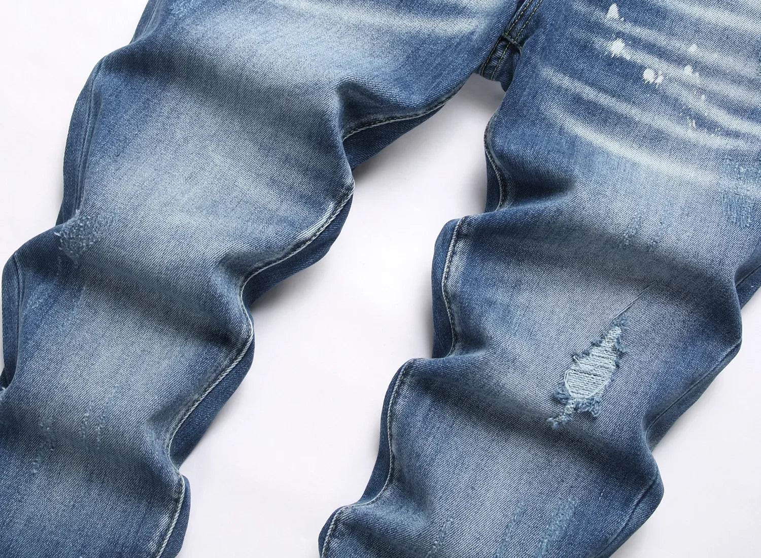 2025 Men's Ripped Jeans Luxury Brand Light Blue Holes Long Trousers Quality Male Fashion Stretch Slim Pants Men Skinny Jeans.