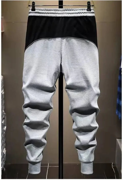 Lässige Herrenhose, koreanische trendige, locker sitzende Hose für dicke Leute, Herren-Jogginghose mit Gürtel und Spleißen.